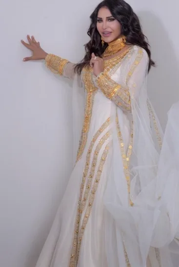 نظرة على أجمل وأحدث فساتين أحلام الشامسي