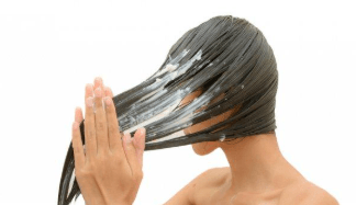 إكسير الحياة لشعرك: تعرفي على فوائد حليب جوز الهند للشعر