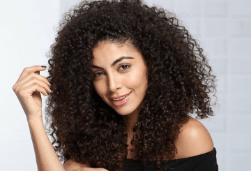 إكسير الحياة لشعرك: تعرفي على فوائد حليب جوز الهند للشعر